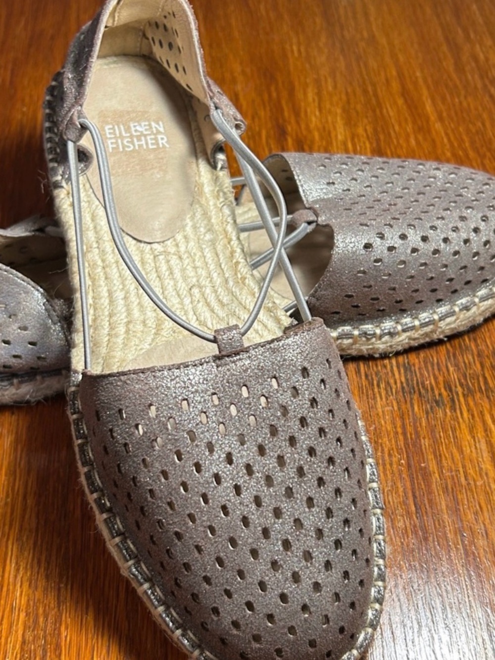 Barely worn Eileen Fisher Perferated Metallic Bronze Espadrille Flats. Size 7.5